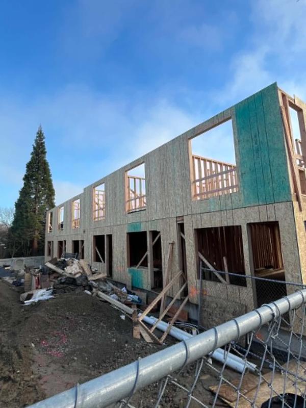 Row of townhomes framed with OSB sheathing