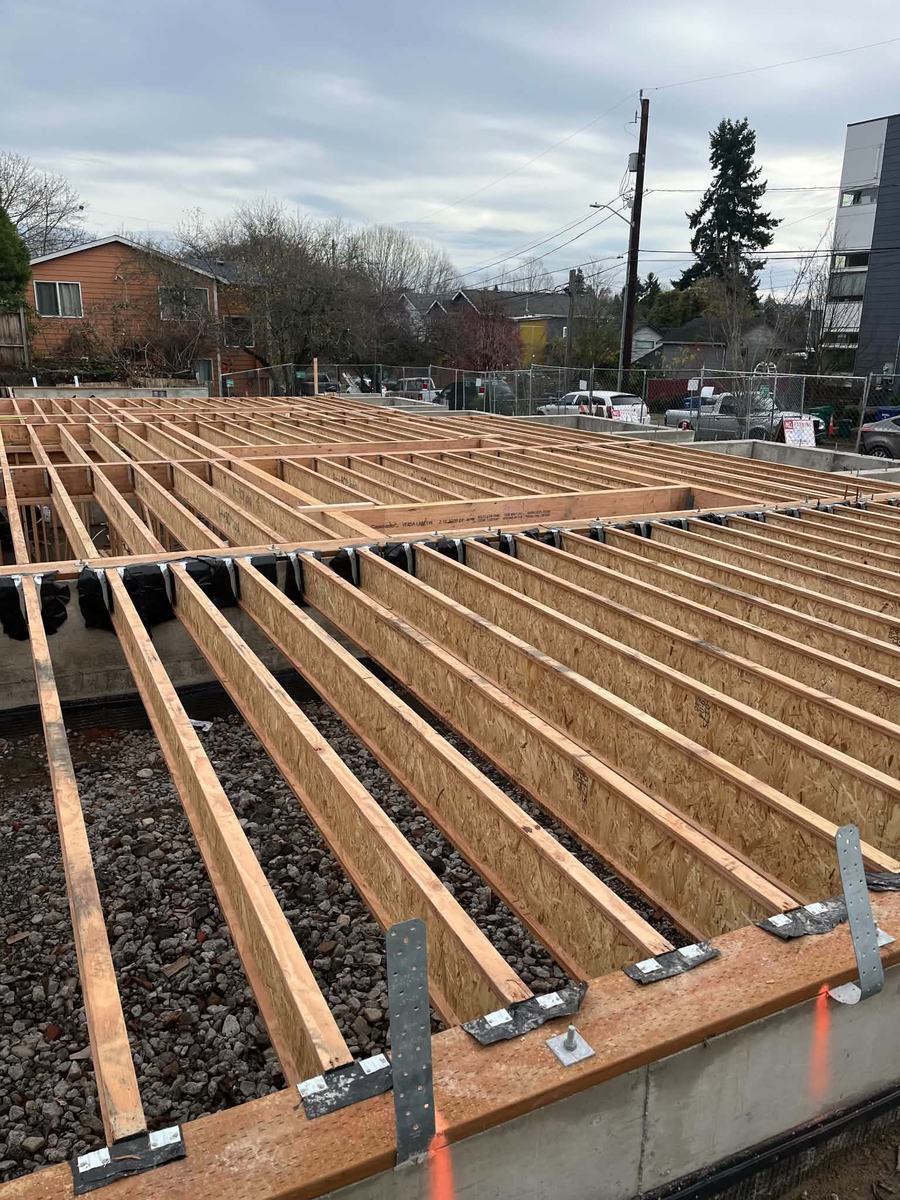 Structural floor joist framing for a home addition